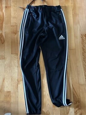 Adidas black joggers with white side stripes